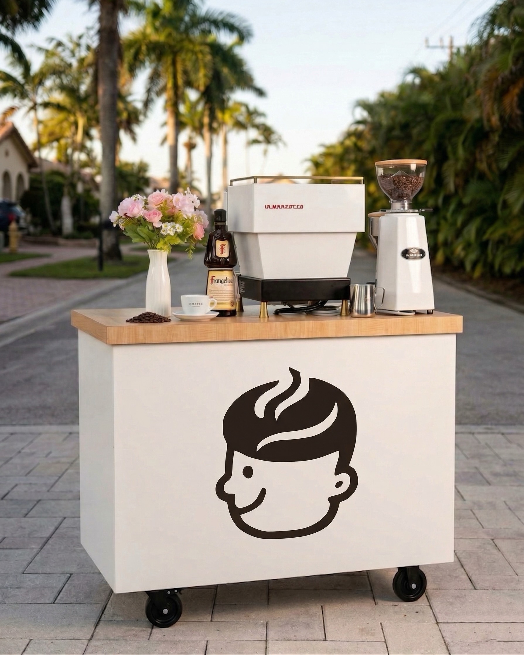 Hey Coffee mobile cart outdoors with espresso machine and palm trees